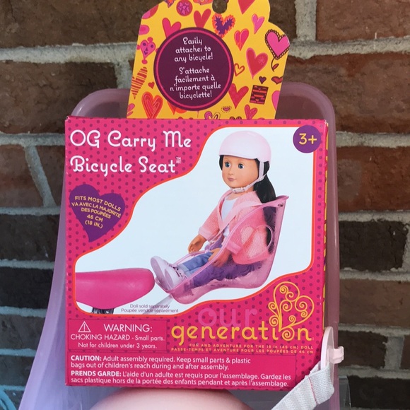 Our Generation Carry Me Bicycle Seat for 18 Inch Dolls - With Helmet in Pink - Picture 2 of 3